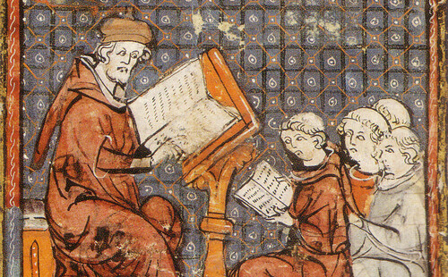 Teaching at Paris, in a late;Castres, bibliothèque municipale, ms. 3, f. 277r;domena_publiczna 14th-century Grandes Chroniques de France: the tonsured students sit on the floor